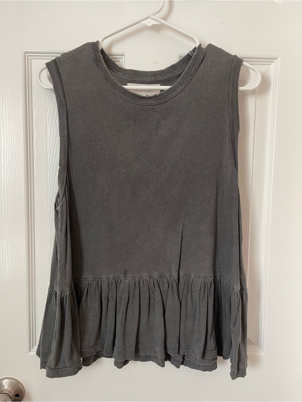 THE GREAT. Washed Charcoal Sleeveless Ruffle-Hem Muscle Tee